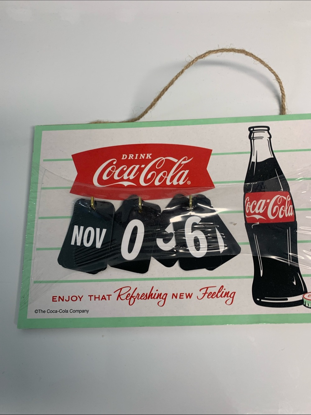 Coca Cola Black & Red Hanging Flip Calendar Sign lightweight 8in by 5 in